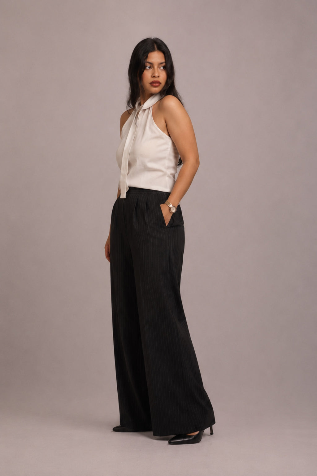 Model wearing the SEANT 006 fluid wide-leg trouser in black