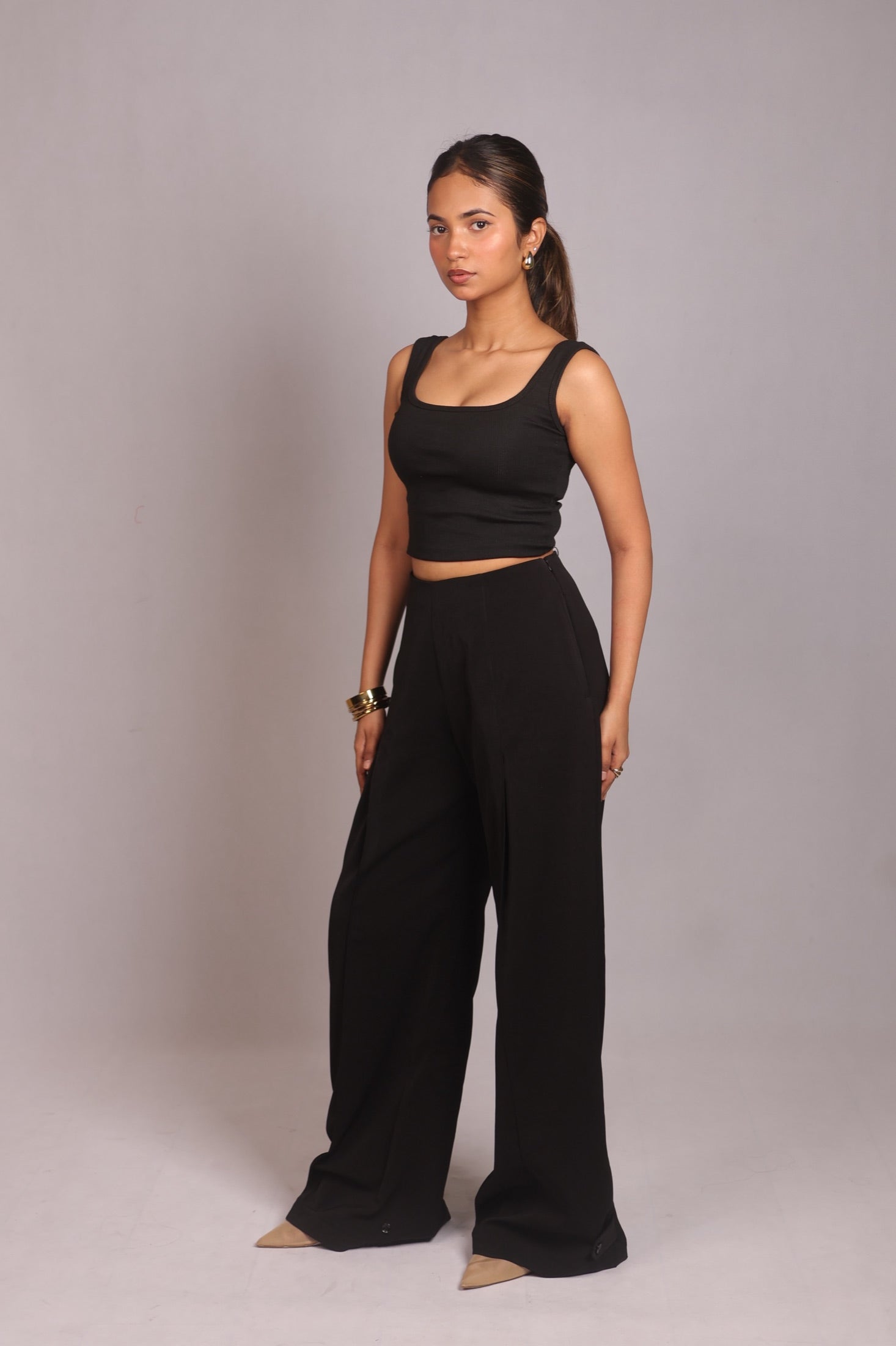 Model wearing the SEANT 005 ribbed knit tank in black