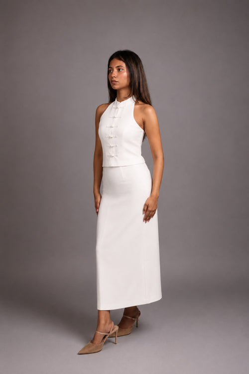 Model wearing the SEANT 003 mandarin halter top in ivory